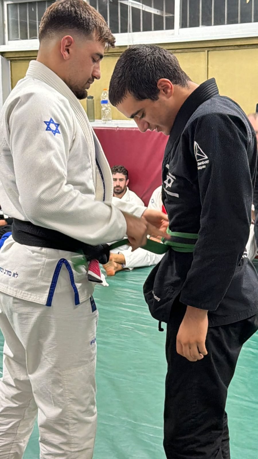 מתאמן נוער ב-Fusion BJJ חיפה מקבל חגורה ירוקה משלו אלנברג